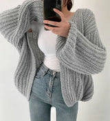 Damen Strickjacke mit offener Front langen Ärmeln und Grobstrickoberfläche – Grau