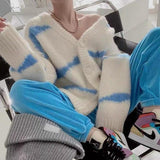 Damen-strickjacke mit v-ausschnitt knopfverschluss und streifen – Blau