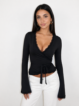 Damen Wickeltop mit langen Ärmeln, Spitzenbesatz und seitlichem Bindeband – Schwarz