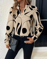 Damenbluse mit grafischem Muster und Stehkragen – Beige