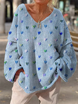 Damen Strickpullover mit bunten Herzmotiven und V-Ausschnitt – Blau