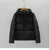 Warmer damen-wintermantel 2024: eleganter puffermantel-trend – Schwarz