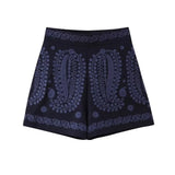 Bestickte High-Waist Shorts aus veganem Leder – Blau