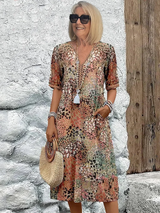 Damen Kleid mit V-Ausschnitt | Knie­länge und Musterdesign – Beige