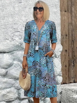 Damen Kleid mit V-Ausschnitt | Knie­länge und Musterdesign – Blau