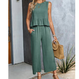 Celeste - Ärmelloser Jumpsuit mit weitem Bein und Rüschen – Grau-Blau