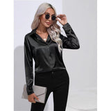 Luna - Langärmelige Satinbluse mit raffiniertem Touch – Schwarz