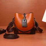 Celine™ Raffinesse in der Hand – Orange