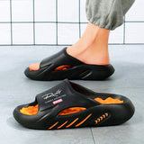 Sarynx - Gepolsterte Pantoletten – Schwarz Orange