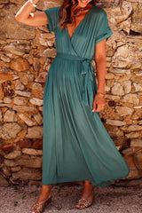 Geraldine – Elegante Wickelkleid mit femininen Raffungen – Dunkelgrün