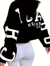 Pullover im oversize-design mit langen armeln und textlogo auf dem armel – Schwarz