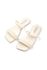 Stilvolle schwarze Sandalen mit minimalistischem Design – Elfenbein