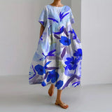 VALENTINA | Sommerliches Blumenmuster-Kleid mit schmeichelhaftem Schnitt und Bewegungsfreiheit – Blau
