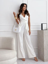 Isla - Ärmelloser rosa Jumpsuit mit Gürtel – Weiß