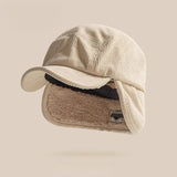 Rojie™ – Gerippte Mütze mit Ohrenklappen – Beige