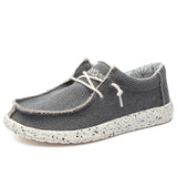Herren Schnürschuhe mit strukturierter Oberfläche und kontrastierender Sohle – Grau