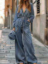 Nadia | Denim-Jumpsuit mit Taillenkordel und langen Ärmeln – Blau
