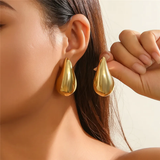Tropfenohrringe aus Gold und Silber – Gold
