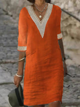 Schickes Kleid aus Leinenmischung mit V-Ausschnitt und Spitzenbesatz – Orange