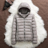 Manuela – Wasserdichte Jacke Mit Weißen Entenfedern – Grau