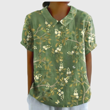 Kurzärmelige Damenbluse mit Blumenmuster und Bubikragen – Grün