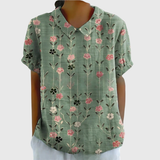 Kurzärmelige Damenbluse mit Blumenmuster und Bubikragen – Salbeigrün
