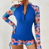 Langärmliger Rashguard-Badeanzug mit Frontreißverschluss und Blumenmuster für Damen – Blaue Welle