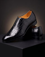 Amphon – Loafer mit Krokodilprägung und Slip-On-Passform – Schwarz