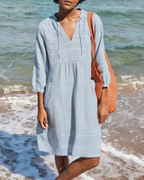 Plony – Leichtes Strandkleid aus strukturierter Baumwolle mit V-Ausschnitt – Blau