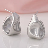 Micara - Molten Crescents - Ohrringe – Silber