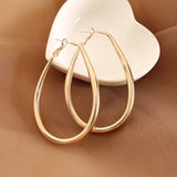 Micara - Teardrop Hoops - Ohrringe – Gold