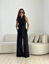 Kamwi - Eleganter Jumpsuit Mit Drapiertem Ausschnitt Und Weitem Bein – Schwarz