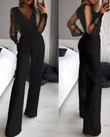 Bailen | Jumpsuit mit transparenten Ärmeln – Schwarz