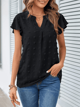 Bluse mit Patchwork und Rüschen – Schwarz
