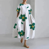 Jamila – Oversize-Kleid aus bedrucktem Baumwollleinen – Weiß geblümt