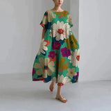 Jamila – Oversize-Kleid aus bedrucktem Baumwollleinen – Grün