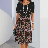 Ursulla - Elegantes Kleid Mit Rundhalsausschnitt Und Blumenmuster – Schwarz